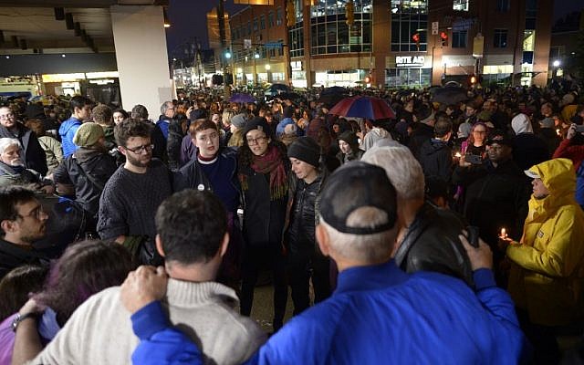 Members of the Squirrel Hill community come together for a student-organized candle vigil in rememberance of those who died earlier in the day during a shooting at the Tree of Life Synagogue in the Squirrel Hill neighborhood of Pittsburgh on October 27, 2018. (Dustin Franz / AFP) Members of the Squirrel Hill community come together for a student-organized candle vigil in rememberance of those who died earlier in the day during a shooting at the Tree of Life Synagogue in the Squirrel Hill neighborhood of Pittsburgh on October 27, 2018. (Dustin Franz / AFP)