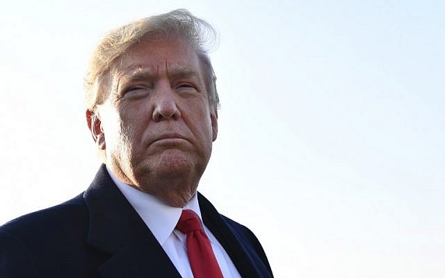 In this photo from October 27, 2018, US President Donald Trump speaks with reporters before departing for a rally in Murphysboro, Illinois. (Nicholas Kamm/AFP) In this photo from October 27, 2018, US President Donald Trump speaks with reporters before departing for a rally in Murphysboro, Illinois. (Nicholas Kamm/AFP)