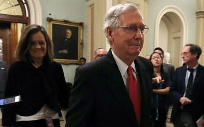 Senate Majority Leader Mitch McConnell, Republican from Kentucky, walks off the Senate floor at the US Capitol on October 5, 2018 in Washington, DC. (Mark Wilson/Getty Images/AFP)