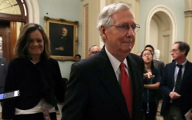Senate Majority Leader Mitch McConnell, Republican from Kentucky, walks off the Senate floor at the US Capitol on October 5, 2018 in Washington, DC. (Mark Wilson/Getty Images/AFP)