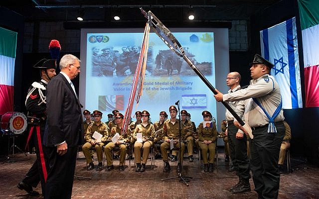 The Italian Ambassador to Israel, Gianluigi Benedetti, presents the Gold Medal for Military Valor to the IDF's 7th Armored Brigade on October 3, 2018. (Israel Defense Forces) The Italian Ambassador to Israel, Gianluigi Benedetti, presents the Gold Medal for Military Valor to the IDF's 7th Armored Brigade on October 3, 2018. (Israel Defense Forces)