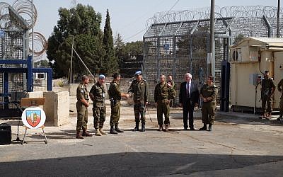 IDF and UNDOF soldiers at the Quneitra Crossing between Israel and Syria in the Golan Heights, as it reopens after four years, on October 15, 2018. (Judah Ari Gross/Times of Israel)