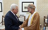 Palestinian Authority President Mahmoud Abbas (left) and Omani Foreign Minister Yusuf bin Alawi shaking hands in Ramallah on October 31, 2018. (Credit: Wafa)