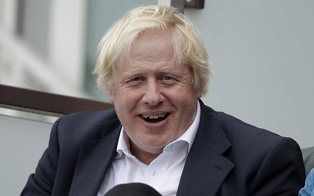 In this photo from September 8, 2018, Britain's former foreign secretary Boris Johnson reacts to seeing photographers taking his picture as he sits in a spectator seat whilst attending the fifth cricket test match of a five match series between England and India at the Oval cricket ground in London. (AP Photo/Matt Dunham, File) In this photo from September 8, 2018, Britain's former foreign secretary Boris Johnson reacts to seeing photographers taking his picture as he sits in a spectator seat whilst attending the fifth cricket test match of a five match series between England and India at the Oval cricket ground in London. (AP Photo/Matt Dunham, File)