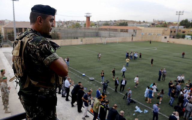 A Lebanese soldier stands guard as Lebanese Foreign Minister Gebran Bassil tours a soccer club, with diplomats and journalists, one of several locations they visited near Beirut's international airport, in Beirut, Lebanon, Monday, Oct. 1, 2018. (AP /Hassan Ammar) A Lebanese soldier stands guard as Lebanese Foreign Minister Gebran Bassil tours a soccer club, with diplomats and journalists, one of several locations they visited near Beirut's international airport, in Beirut, Lebanon, Monday, Oct. 1, 2018. (AP /Hassan Ammar)