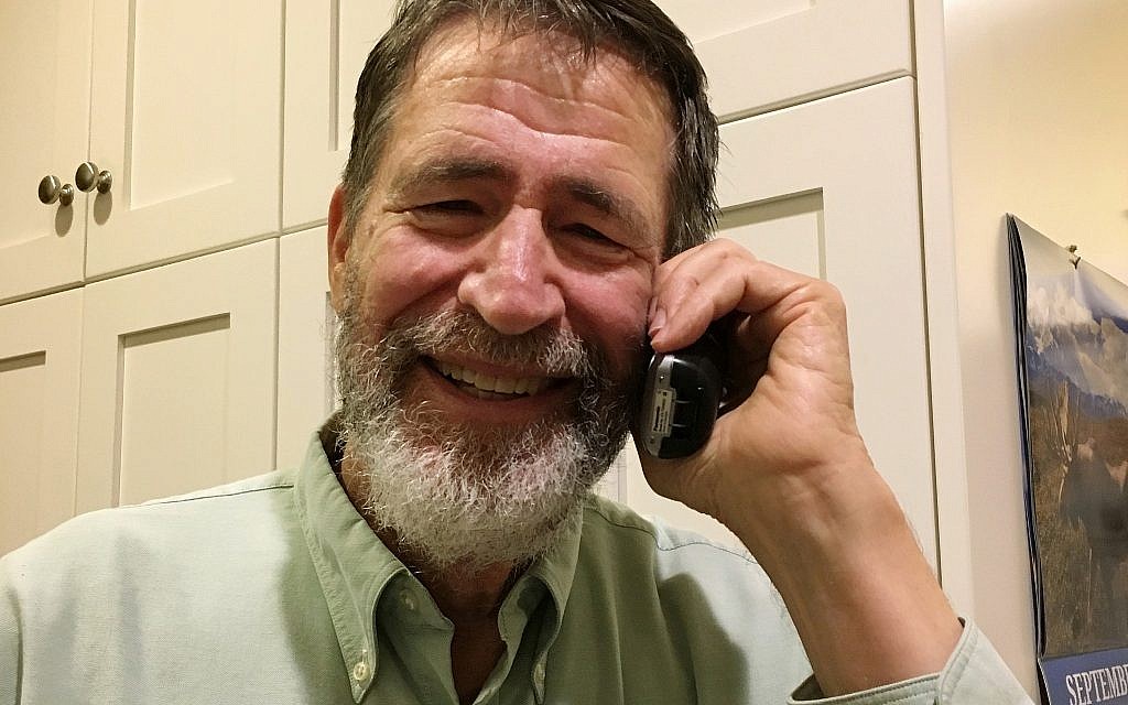 George P. Smith talks on the phone with The Associated Press at his home in Columbia, Missouri, United States, October 3, 2018, after learning he had won the 2018 Nobel Prize in Chemistry. (Marjorie Sable via AP)