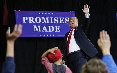 US President Donald Trump waves to supporters after speaking at a campaign rally at Kansas Expocentre, October 6, 2018, in Topeka, Kansas. (AP Photo/Pablo Martinez Monsivais)