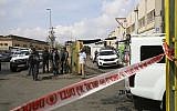Israeli security forces stand at the entrance of the Barkan Industrial Zone in the northern West Bank on October 7, 2018, after a fatal terrorist attack there. (AP Photo/Oded Balilty)