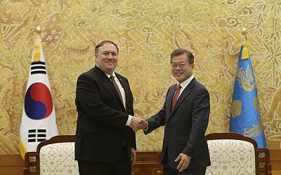South Korean President Moon Jae-in, right, shakes hands with US Secretary of State Mike Pompeo during a meeting at the presidential Blue House in Seoul, South Korea, October 7, 2018. (AP Photo/Ahn Young-joon. Pool)
