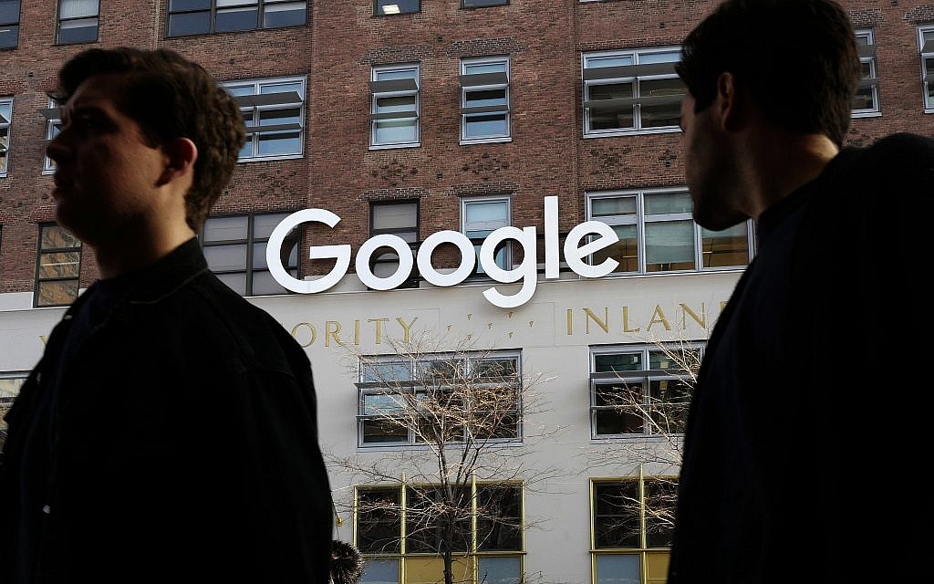 People walk by Google's offices in New York, December 4, 2017. (AP Photo/Mark Lennihan, File) People walk by Google's offices in New York, December 4, 2017. (AP Photo/Mark Lennihan, File)
