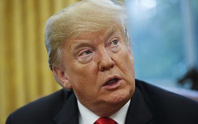 US President Donald Trump speaks during his meeting to discuss potential damage from Hurricane Michael, in the Oval Office of the White House in Washington, October 10, 2018. (AP Photo/Pablo Martinez Monsivais)