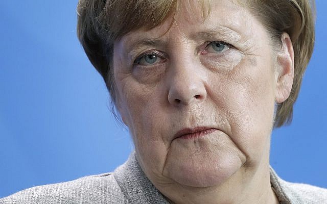 German Chancellor Angela Merkel attends a joint press conference as part of a meeting with Slovenia's Prime Minister Marjan Sarec at the chancellery in Berlin, Germany, October 12, 2018. (AP Photo/Michael Sohn) German Chancellor Angela Merkel attends a joint press conference as part of a meeting with Slovenia's Prime Minister Marjan Sarec at the chancellery in Berlin, Germany, October 12, 2018. (AP Photo/Michael Sohn)