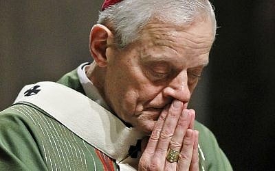In this Wednesday, Oct. 20, 2010 file photo, Archbishop Donald Wuerl prays as he celebrates Mass at the Cathedral of Saint Matthew the Apostle in Washington.  (AP Photo/Alex Brandon, File)