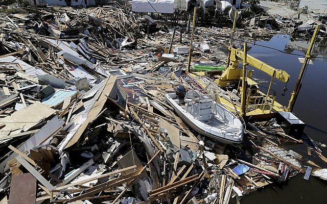 Boats are seen among the rubble along the canals Oct. 12, 2018, in Mexico Beach, Florida (Pedro Portal/Miami Herald via AP)
