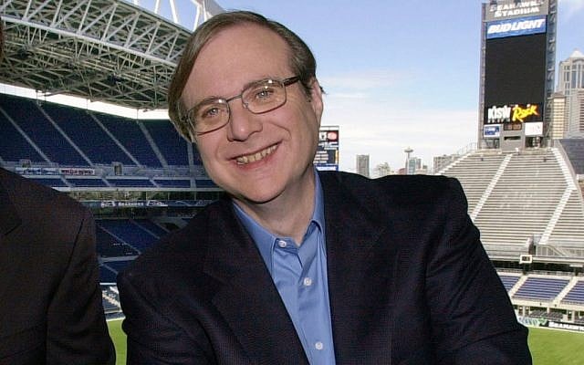 In this July 17, 2001 file photo, Seattle Seahawks owner Paul Allen appears in a suite in the team's stadium in Seattle. Allen, billionaire owner of the Trail Blazers and the Seattle Seahawks and Microsoft co-founder, died Monday, Oct. 15, 2018 at age 65. Earlier this month Allen said the cancer he was treated for in 2009, non-Hodgkin’s lymphoma, had returned. (AP Photo/Elaine Thompson, File) In this July 17, 2001 file photo, Seattle Seahawks owner Paul Allen appears in a suite in the team's stadium in Seattle. Allen, billionaire owner of the Trail Blazers and the Seattle Seahawks and Microsoft co-founder, died Monday, Oct. 15, 2018 at age 65. Earlier this month Allen said the cancer he was treated for in 2009, non-Hodgkin’s lymphoma, had returned. (AP Photo/Elaine Thompson, File)