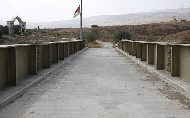 A Jordanian flag hangs on a bridge leading from Israel to Jordan in the Jordan valley area called Naharayim, or Baqura in Arabic, in northern Israel, Monday, Oct. 22, 2018 (AP Photo/Ariel Schalit) A Jordanian flag hangs on a bridge leading from Israel to Jordan in the Jordan valley area called Naharayim, or Baqura in Arabic, in northern Israel, Monday, Oct. 22, 2018 (AP Photo/Ariel Schalit)