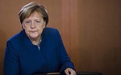 German Chancellor Angela Merkel arrives for the weekly cabinet meeting of the German government at the chancellery in Berlin, October 24, 2018. (Markus Schreiber/AP)