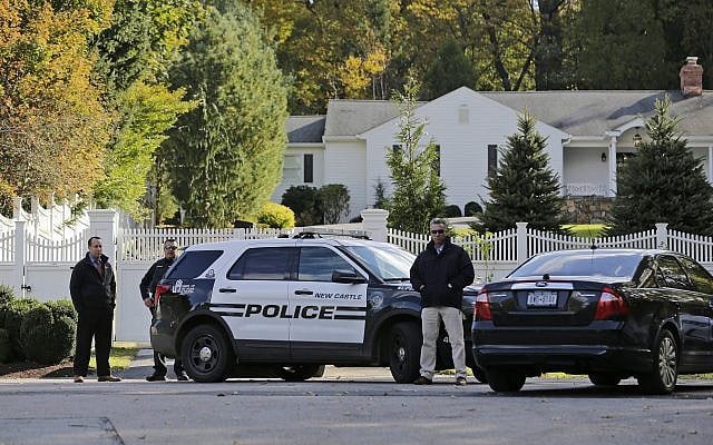 Police officers stand in front of property owned by former secretary of state Hillary Clinton and former president Bill Clinton in Chappaqua, New York, on October 24, 2018. (AP Photo/Seth Wenig) Police officers stand in front of property owned by former secretary of state Hillary Clinton and former president Bill Clinton in Chappaqua, New York, on October 24, 2018. (AP Photo/Seth Wenig)