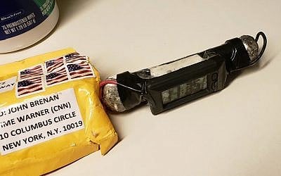 This image obtained October. 24, 2018, and provided by ABC News shows a package addressed to former CIA head John Brennan and an explosive device that was sent to CNN's New York office. (ABC News via AP)