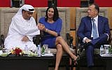 Israeli Culture and Sport Minister Miri Regev, middle, shakes hands with Mohamed Bin Tha'loob Al Derai, President of UAE Wrestling Judo & Kickboxing Federation, after one Israeli player won the bronze medal during the Abu Dhabi Grand Slam Judo tournament in Abu Dhabi, United Arab Emirates, Saturday, Oct. 27, 2018. (AP/Kamran Jebreili)