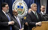 United States Attorney Scott Brady, at podium, speaks with members of the media during a news conference in the aftermath of a deadly shooting at the Tree of Life Synagogue in Pittsburgh, Sunday, Oct. 28, 2018. (AP Photo/Matt Rourke)