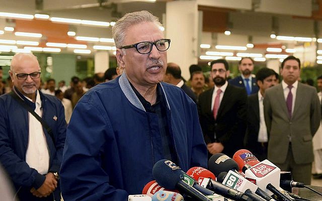Pakistan's President Arif Alvi talks to journalists prior to departing to Turkey on a three-day visit, in Islamabad, Pakistan, October 28, 2018. (Press Information Department via AP) Pakistan's President Arif Alvi talks to journalists prior to departing to Turkey on a three-day visit, in Islamabad, Pakistan, October 28, 2018. (Press Information Department via AP)