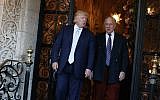 Donald Trump walks with Ronald Lauder after meeting at Mar-a_Lago on December 28, 2016, in Palm Beach, Florida, (AP Photo/Evan Vucci)