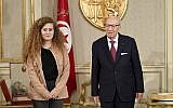 Tunisian President Beji Caid Essebsi, right, greets Palestinian activist Ahed Tamimi at the presidential palace, in Carthage near Tunis, Tunisia, October 2, 2018 (Hassene Dridi/AP)