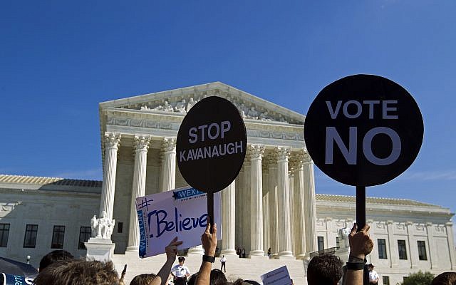 Demonstrators protest against Supreme Court nominee Brett Kavanaugh, as they rally outside of the U.S. Supreme Court, on Thursday, Oct. 4, 2018, in Washington. (AP Photo/Jose Luis Magana) Demonstrators protest against Supreme Court nominee Brett Kavanaugh, as they rally outside of the U.S. Supreme Court, on Thursday, Oct. 4, 2018, in Washington. (AP Photo/Jose Luis Magana)