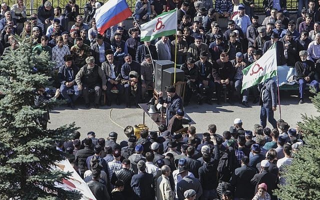 People attend a protest against the new land swap deal agreed by the heads of the Russian regions of Ingushetia and Chechnya, in Ingushetia's capital Magas, Russia, Oct. 8, 2018 (AP Photo/Musa Sadulayev) People attend a protest against the new land swap deal agreed by the heads of the Russian regions of Ingushetia and Chechnya, in Ingushetia's capital Magas, Russia, Oct. 8, 2018 (AP Photo/Musa Sadulayev)
