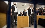 American Lara Alqasem, center, sits in a courtroom prior to a hearing at the district court in Tel Aviv, Israel, Thursday, Oct. 11, 2018.(AP Photo/Sebastian Scheiner)