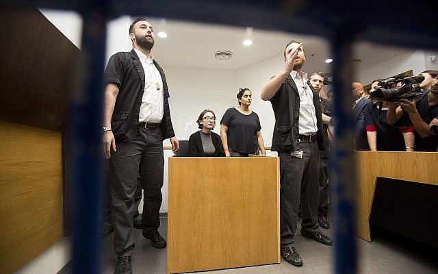 American Lara Alqasem, center, sits in a courtroom prior to a hearing at the district court in Tel Aviv, Israel, Thursday, Oct. 11, 2018.(AP Photo/Sebastian Scheiner) American Lara Alqasem, center, sits in a courtroom prior to a hearing at the district court in Tel Aviv, Israel, Thursday, Oct. 11, 2018.(AP Photo/Sebastian Scheiner)