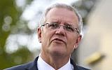 Australian Prime Minister Scott Morrison speaks to the media in Canberra, October 17, 2018. (Lukas Coch/AAP Image via AP)