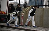 Turkish police crime scene investigators, looking for possible clues into the killing of Saudi journalist Jamal Khashoggi, walk toward an underground parking lot, where authorities had found a vehicle belonging to the Saudi consulate, in Istanbul, October 23, 2018. (AP/Emrah Gurel)