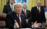 US President Donald Trump speaks, following a ceremony signing the 'America's Water Infrastructure Act of 2018' into law in the Oval Office at the White House on October 23, 2018. (AP Photo/Manuel Balce Ceneta)