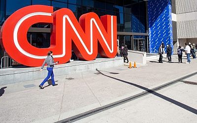 People walk outside CNN Center, in Atlanta, October 24, 2018. (Ron Harris/AP)
