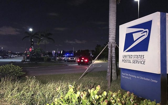 Postal service police screen employees entering the Royal Palm processing and Distribution Center, Thursday, Oct. 25, 2018 in Opa-locka, Fla. (AP/Josh Replogle) Postal service police screen employees entering the Royal Palm processing and Distribution Center, Thursday, Oct. 25, 2018 in Opa-locka, Fla. (AP/Josh Replogle)