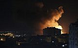 Smoke rises from an explosion caused by an Israeli airstrike on Gaza City, early Saturday, Oct. 27, 2018 (AP Photo/Adel Hana)