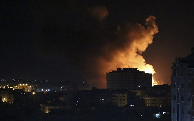 Smoke rises from an explosion caused by an Israeli airstrike on Gaza City, early Saturday, Oct. 27, 2018 (AP Photo/Adel Hana)