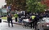 First responders surround the Tree of Life Synagogue in Pittsburgh, Pa., where a shooter opened fire Saturday, Oct. 27, 2018. (AP Photo/Gene J. Puskar)