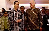 Indonesia President Joko "Jokowi" Widodo, front left, walks with Australia former Prime Minister Malcolm Turnbull, front right, during their bilateral meeting at Our Ocean Conference in Bali, Indonesia Monday, Oct. 29, 2018.(AP Photo/Firdia Lisnawati)