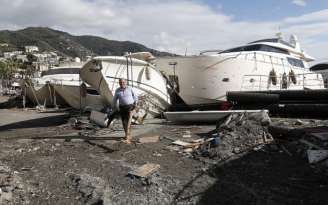 Boats are washed ashore, a day after a storm, in Rapallo, northern Italy, Tuesday, Oct. 30, 2018 (AP Photo/Antonio Calanni) Boats are washed ashore, a day after a storm, in Rapallo, northern Italy, Tuesday, Oct. 30, 2018 (AP Photo/Antonio Calanni)
