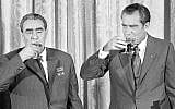 US President Richard M. Nixon, right, and Soviet leader Leonid Brezhnev drink a toast at the White House in Washington, DC, June 21, 1973. The toast comes after the two leaders signed a pact to limit offensive nuclear arsenals. (AP)