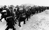 Nazi soldiers on the march over an unnamed road in Denmark, April 9, 1940, seized by Germany in a sudden thrust toward Scandinavian points. (AP Photo)