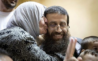 Palestinian Khader Adnan is greeted after his release from an Israeli prison in the West Bank village of Arrabeh near Jenin, July 12, 2015.  (AP Photo/Majdi Mohammed/File)