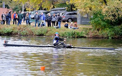 Michal Spalter, in the last half-mile stretch of the Head of the Charles Regatta, in Cambridge, Massachusetts, on a cold, blustery day that made for harsh rowing conditions, October 21, 2018. (Kate Mouligne/courtesy RESOLUTE Racing)