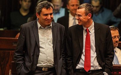 Yariv Levin, right, and Ze'ev Elkin of the Likud party attend a Knesset plenum session on March 12, 2014. (Flash90) Yariv Levin, right, and Ze'ev Elkin of the Likud party attend a Knesset plenum session on March 12, 2014. (Flash90)
