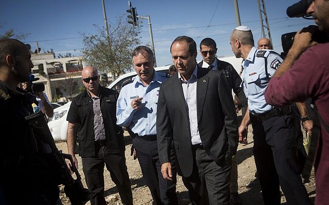 Jerusalem Mayor Nir Barkat, center right, arrives for a tour in the East Jerusalem neighborhoods of Beit Hanina and Shuafat. October 22, 2014. (Miriam Alster/Flash90) Jerusalem Mayor Nir Barkat, center right, arrives for a tour in the East Jerusalem neighborhoods of Beit Hanina and Shuafat. October 22, 2014. (Miriam Alster/Flash90)