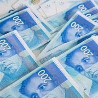 Illustrative photo of 200-shekel bills, February 7, 2016. (Nati Shohat/Flash90)