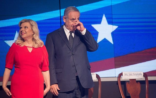 Prime Minister Benjamin Netanyahu and his wife Sara Netanyahu attend a US Independence Day celebration at Avenue in Airport City, on July 3, 2018. (Miriam Alster/Flash90) Prime Minister Benjamin Netanyahu and his wife Sara Netanyahu attend a US Independence Day celebration at Avenue in Airport City, on July 3, 2018. (Miriam Alster/Flash90)